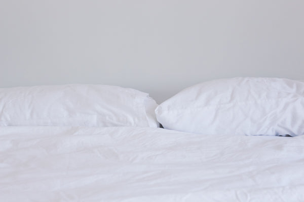 Is Sleeping With Two Pillows Bad For Your Neck?